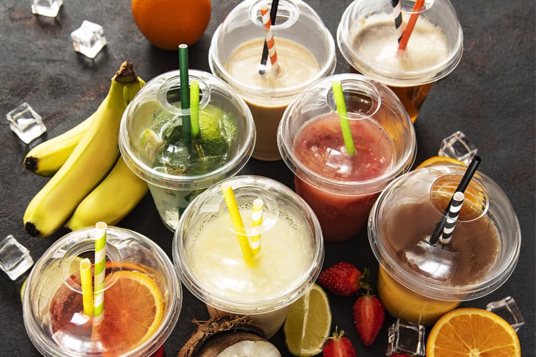 variety of drinks showing dome lids