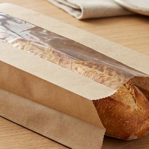 close up of a window bag with a bread loaf inside